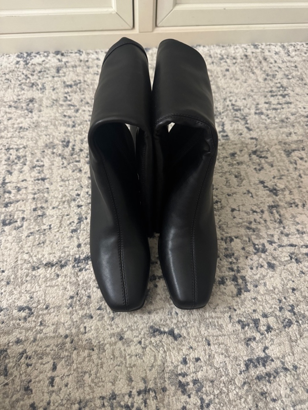 Black tall boots